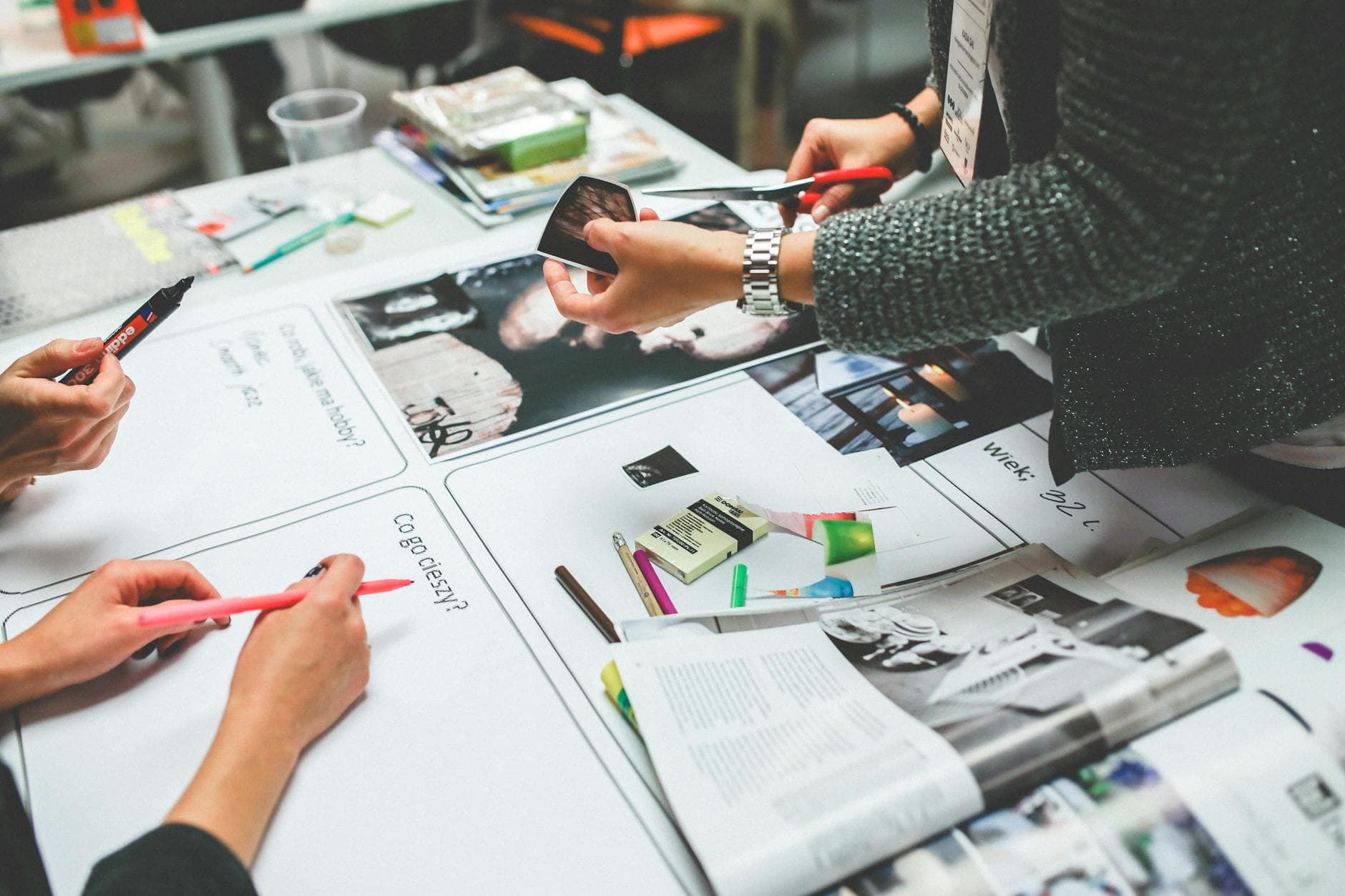 Creative agency founder reviewing IR35 status determination paperwork at desk in London office
