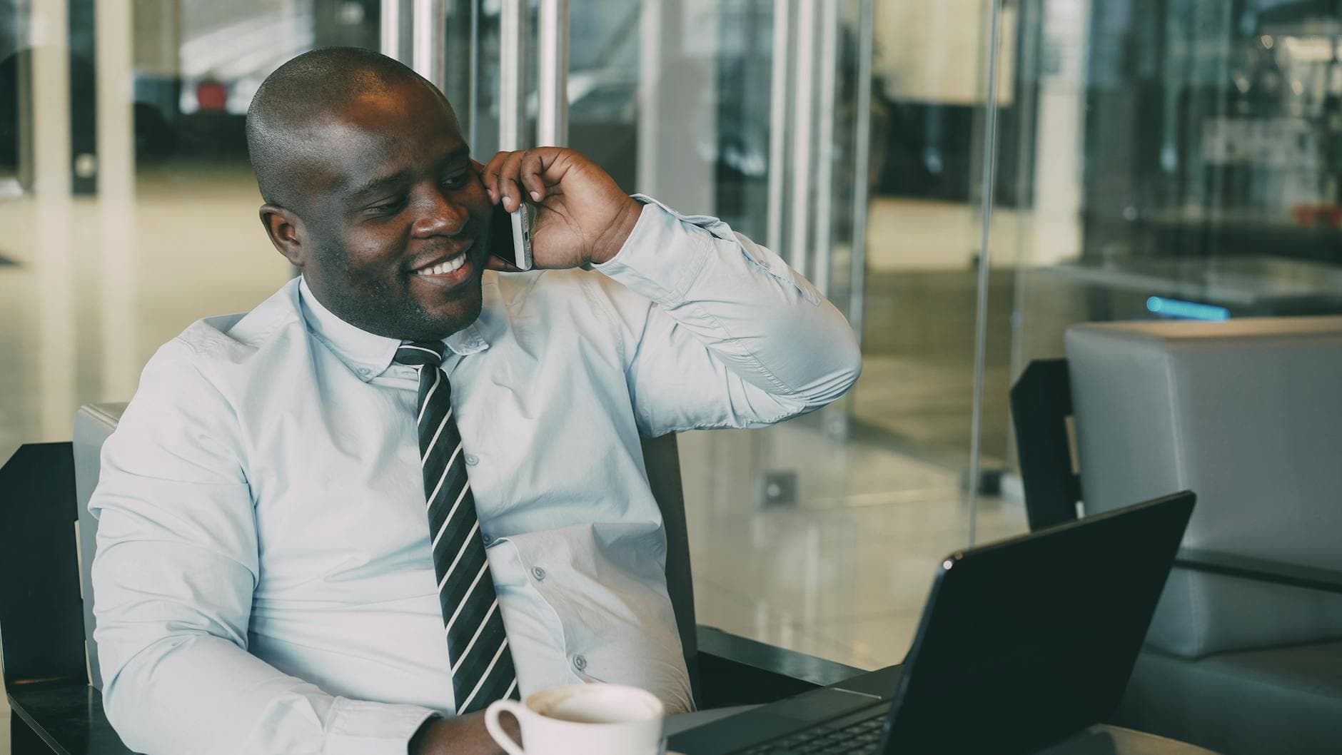 UK agency founder reviewing a contractor agreement with a fixed-fee retainer clause, IR35 compliance documents on desk