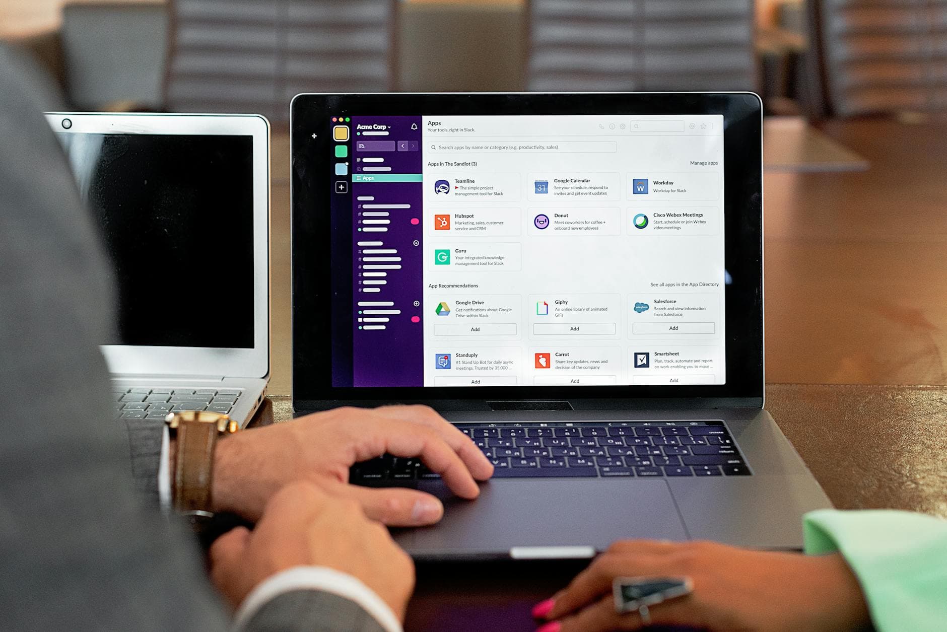 Agency founder reviewing MTD-compatible software integrations on a laptop in a modern UK office