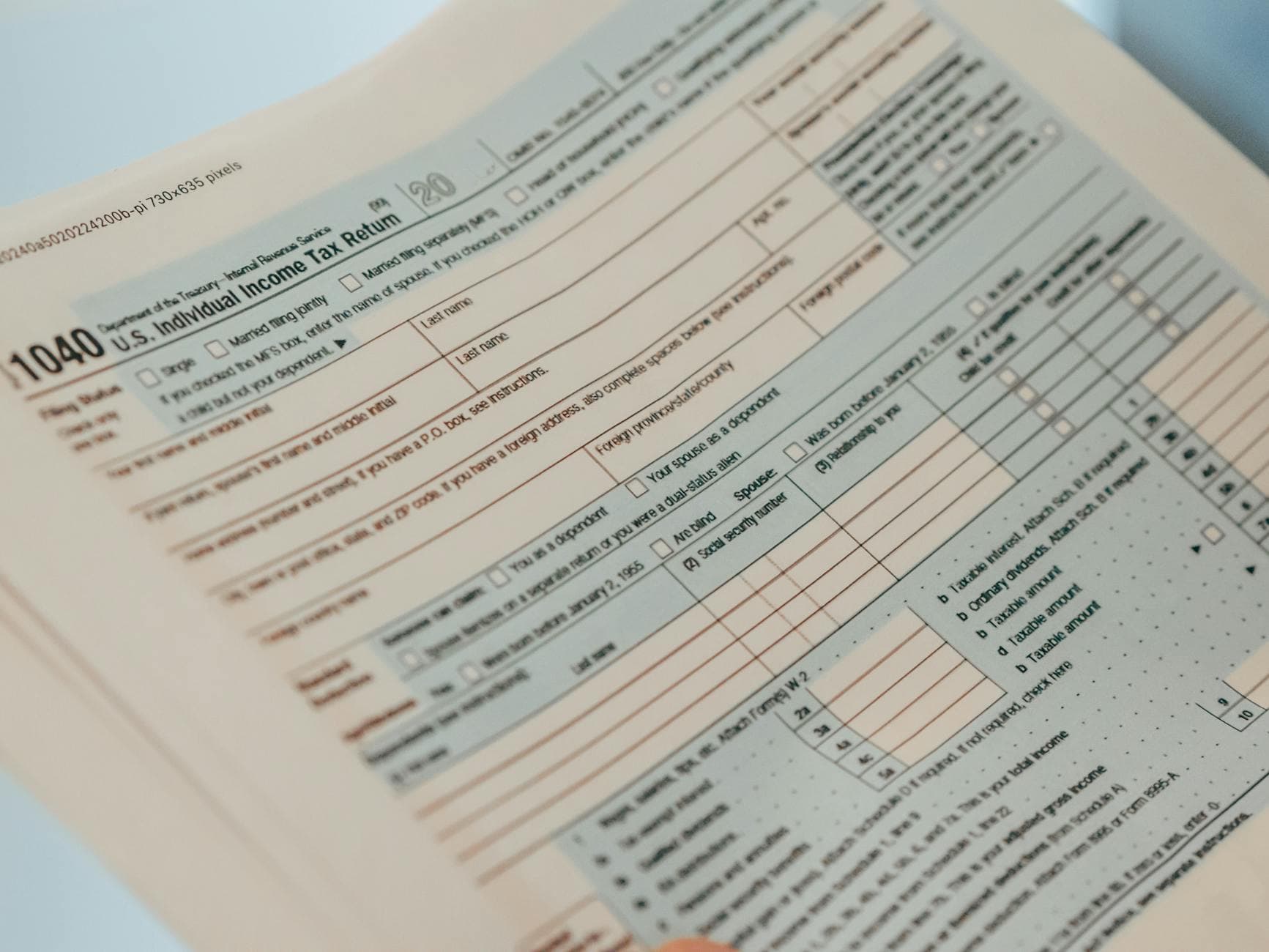 Agency founder reviewing AWS and GCP cloud compute invoices for R&D tax credit claim with accountant in UK office