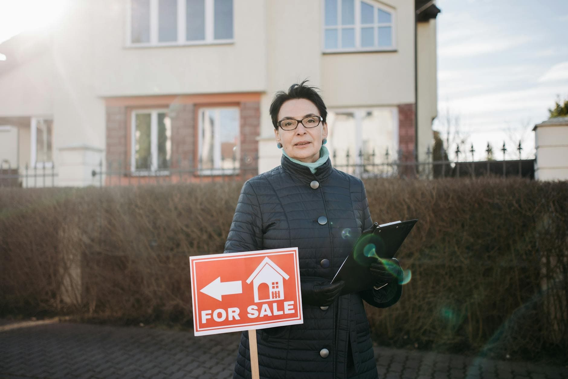 UK property sale completion documents with a calendar showing a 60-day deadline, professional accounting setting